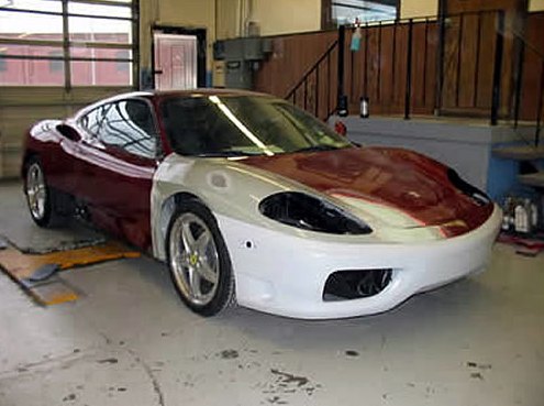 Step 8: Ferrari off the frame bench with primed front panels aligned to the red bodywork